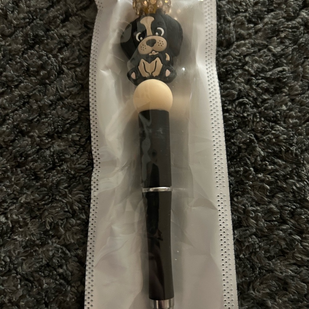 Handcrafted Black Puppy Charm Ballpoint Pen with Beige Accent